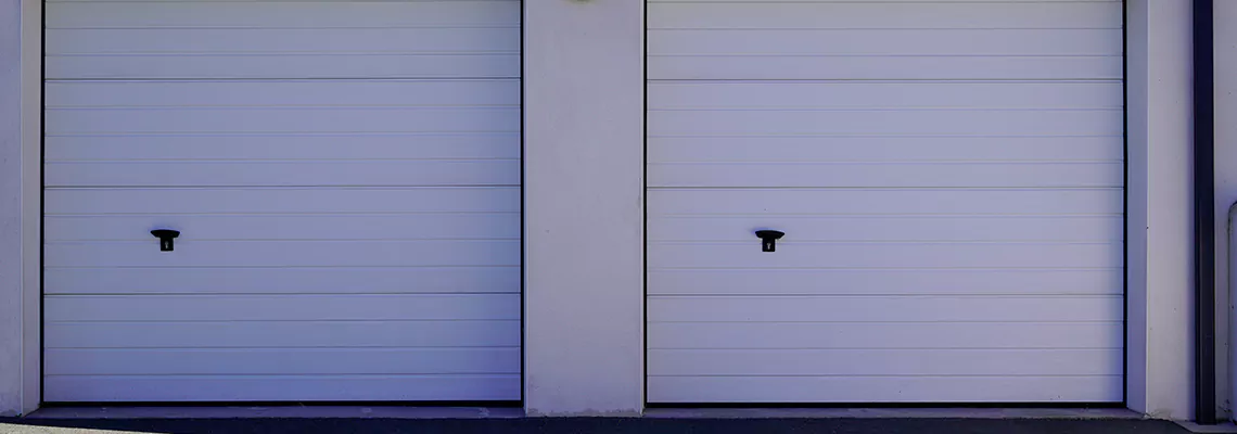 >Sectional Garage Doors Spring Repair in Fredricton, NB