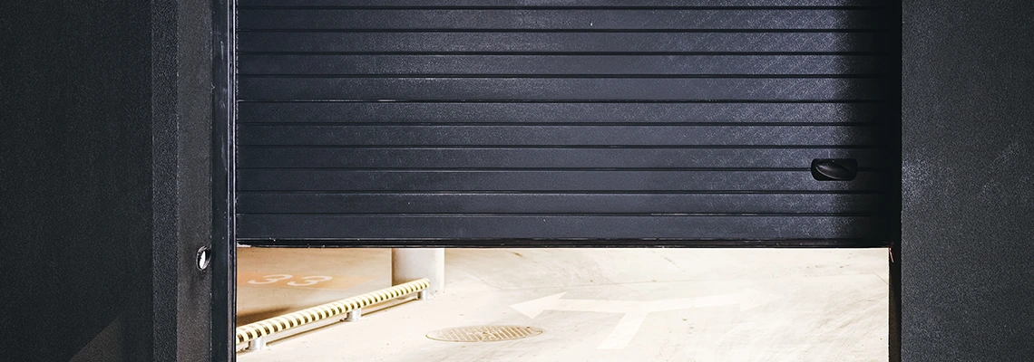 Residential Black Garage Door Installation in Fredricton, NB
