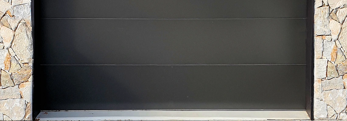 Overhead Black Garage Door Installation in Fredricton, New Brunswick