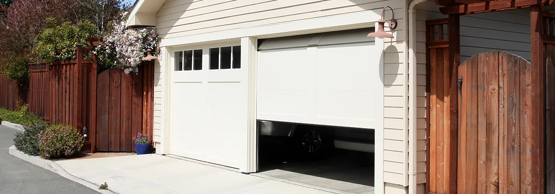 Fix Metal Garage Door Jerking in Fredricton, New Brunswick