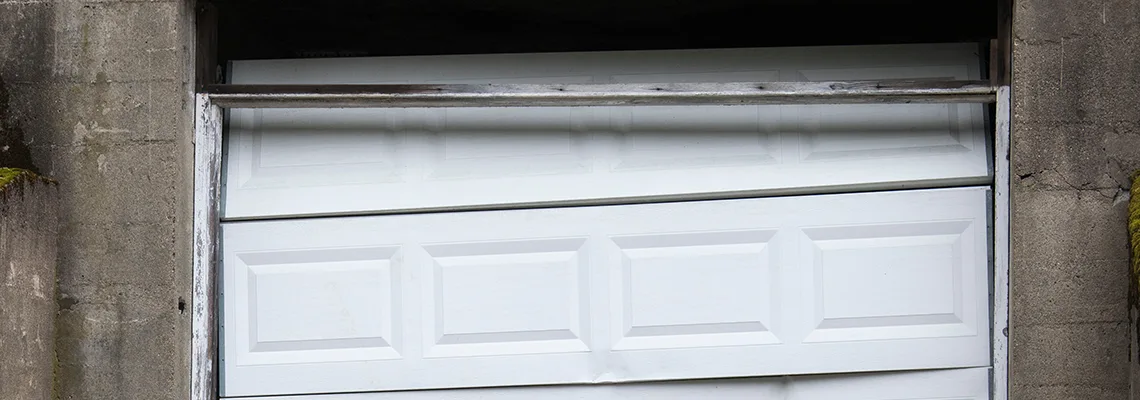 Fallen Commercial Garage Door Repair in Fredricton, New Brunswick